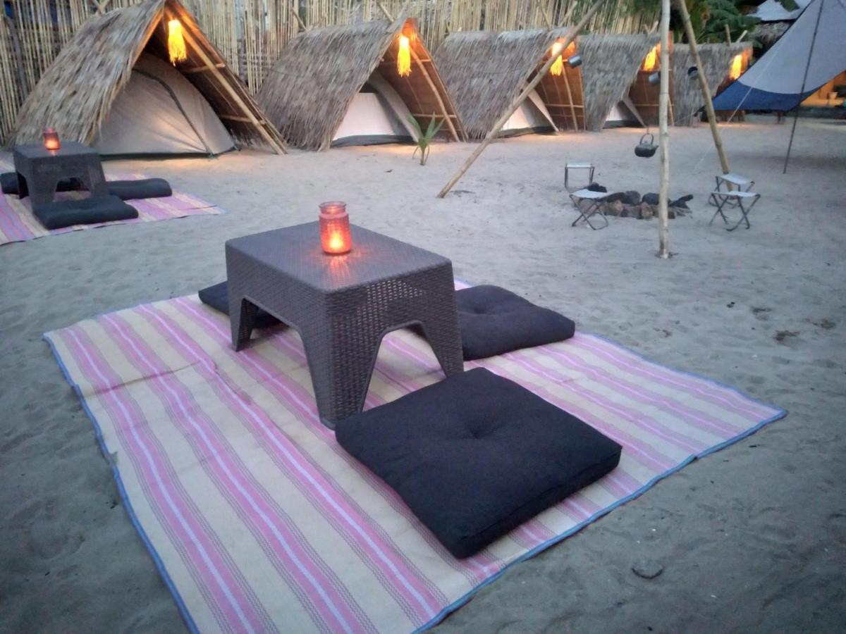 إل نيدو Bucana Kamp Payapa Beachfront المظهر الخارجي الصورة